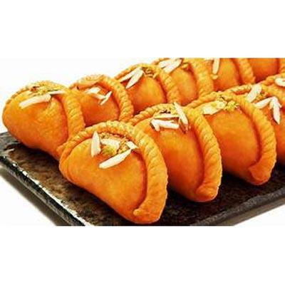 Stuffed Gujjiya (mawa,dry coconut and nuts)